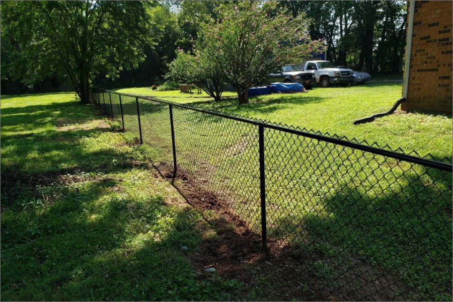 Small black chainlink fence.